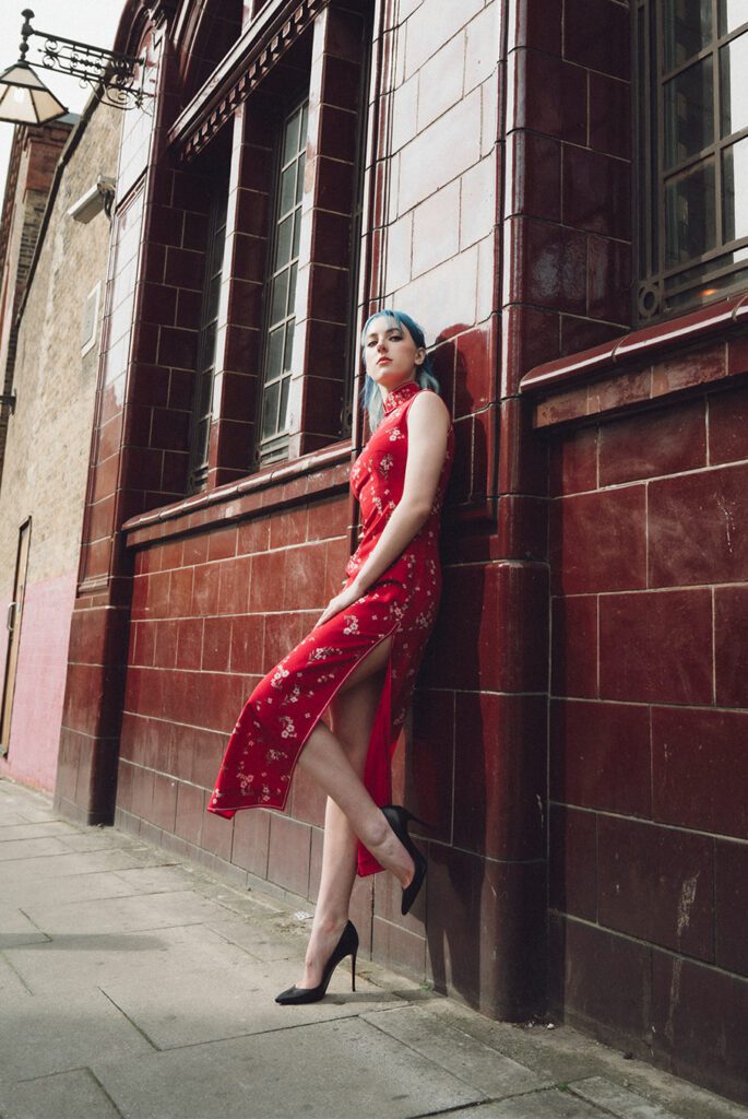 Our muse Alexandra wore a Chinese Dress (Qipao) with her eye catching blue hair.